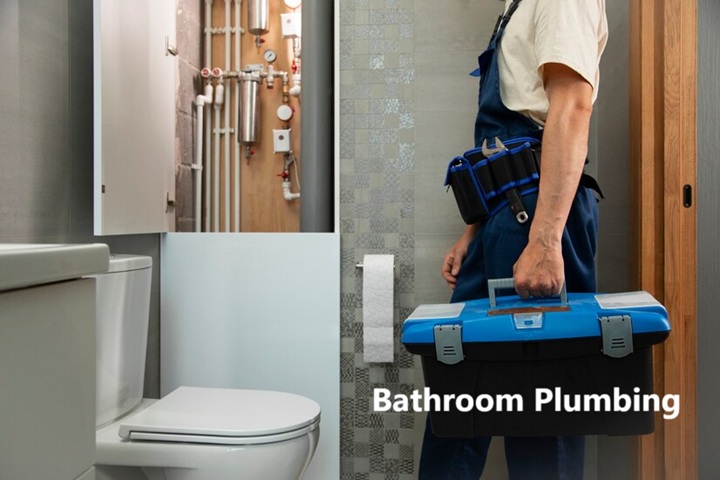 Bathroom Plumbing - A Plumber with toolbox